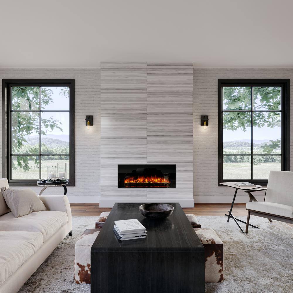 Generation Lighting Tae 5.5 in. W 1-Light Black Industrial Metal Bathroom Wall Sconce with Aged Brass Socket Cup and Black Cord