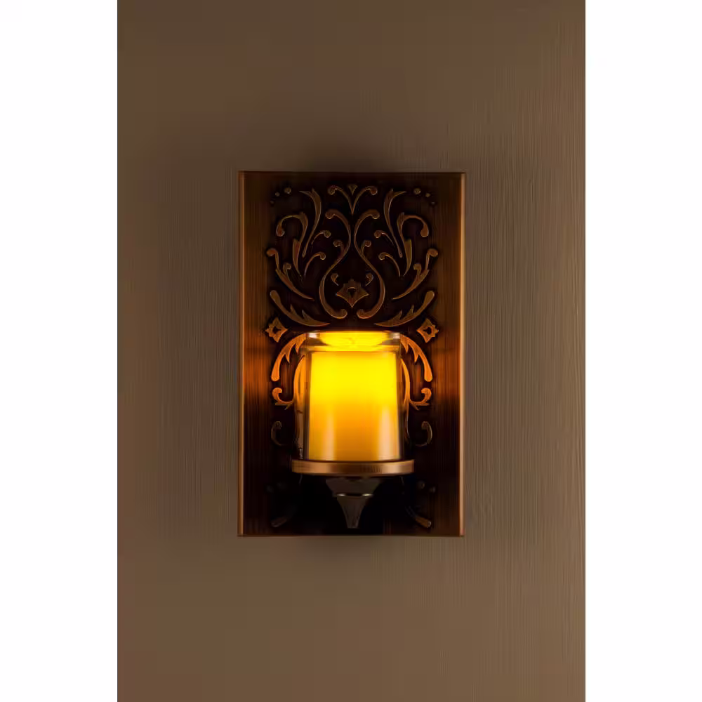 GE 0.5-Watt Oil-Rubbed Plug In Light Sensing Integrated LED Flicker Night Light