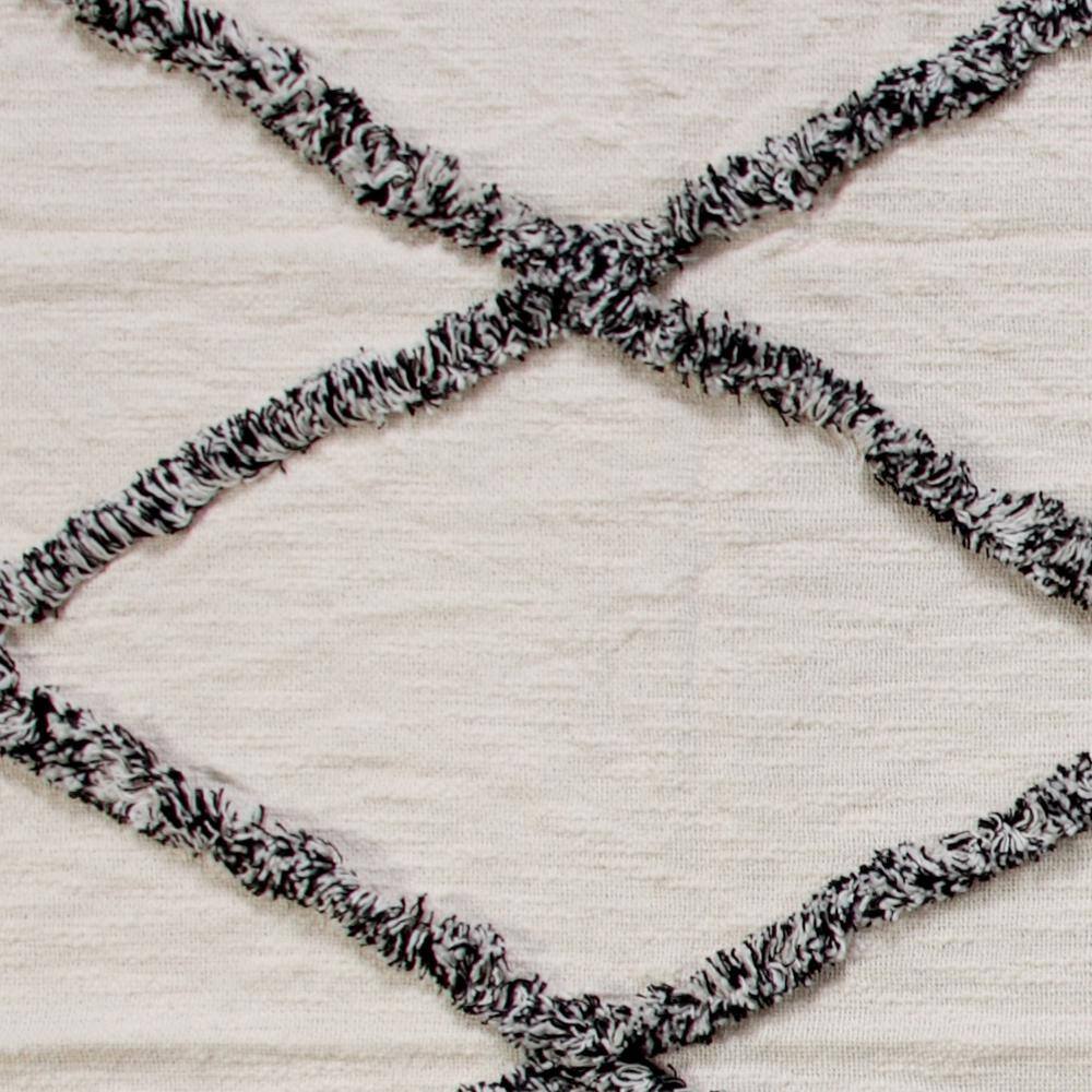 LR Home Norah Soft Crossed 50 in. x 60 in. Black/White Decorative Throw Blanket