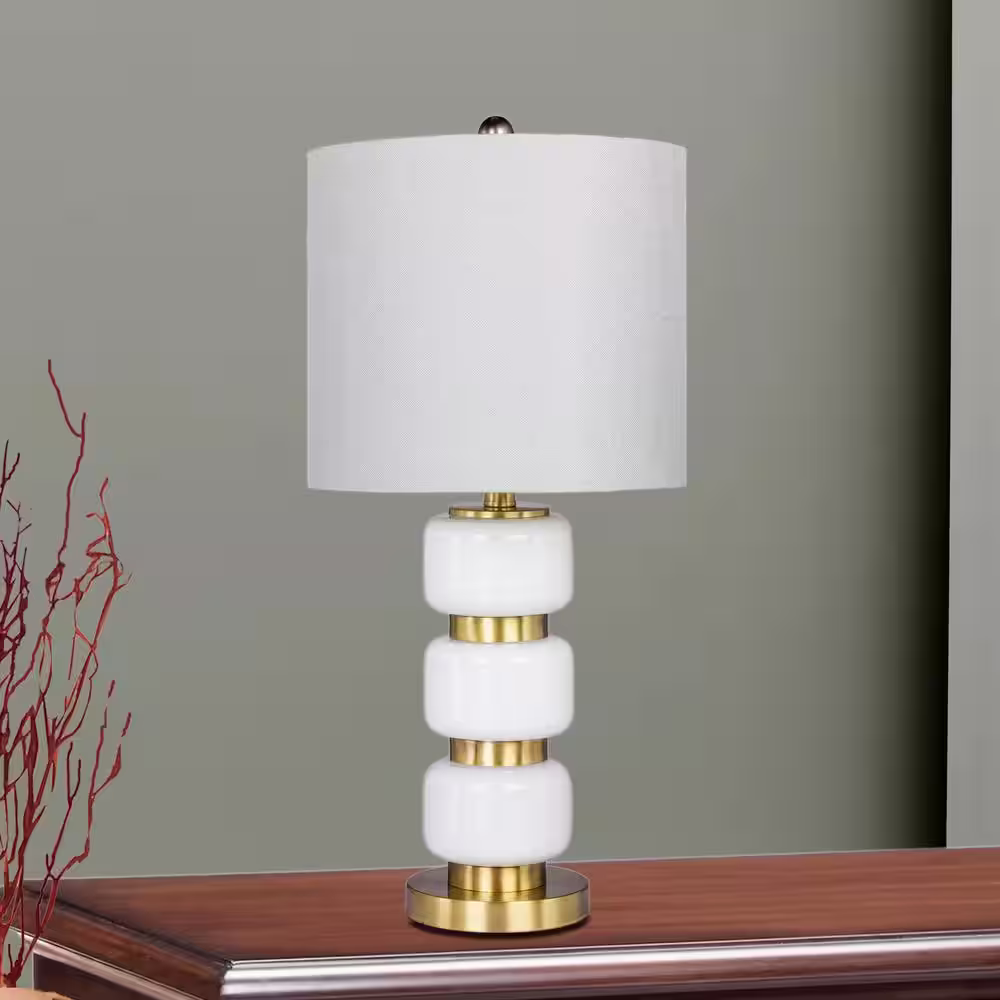 Fangio Lighting 26 in. Smooth, Stacked Glass and Metal Table Lamp in a Antique Brass and White