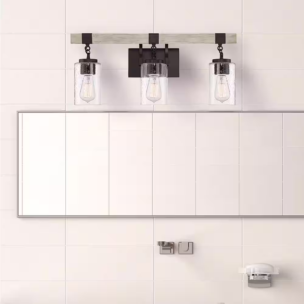 Cordelia Lighting Cordelia Lighting 24.5 in. 3-light Bronze Rustic indoor vanity with Clear Seedy Glass Shades