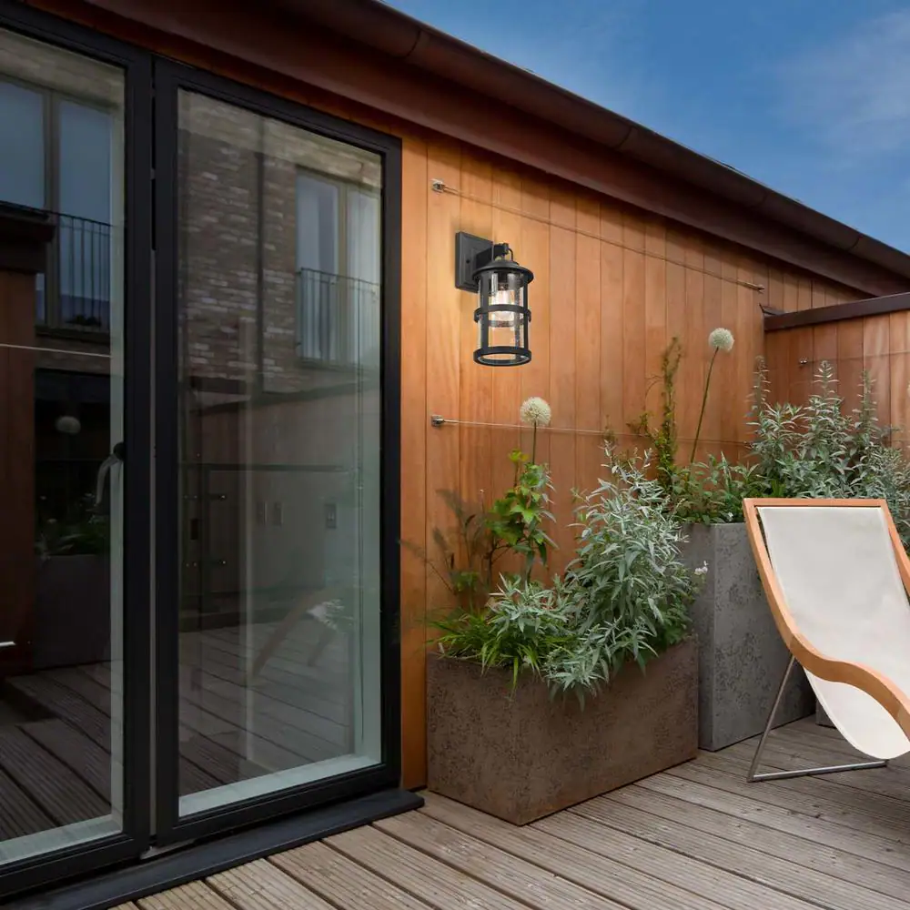 Globe Electric Penelope Matte Black Modern Indoor/Outdoor 1-Light Wall Sconce with Seeded Glass Shade