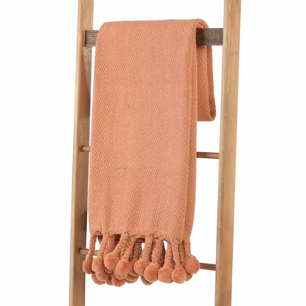 Storied Home Woven Cotton Terracotta Colored Pom Pom Throw