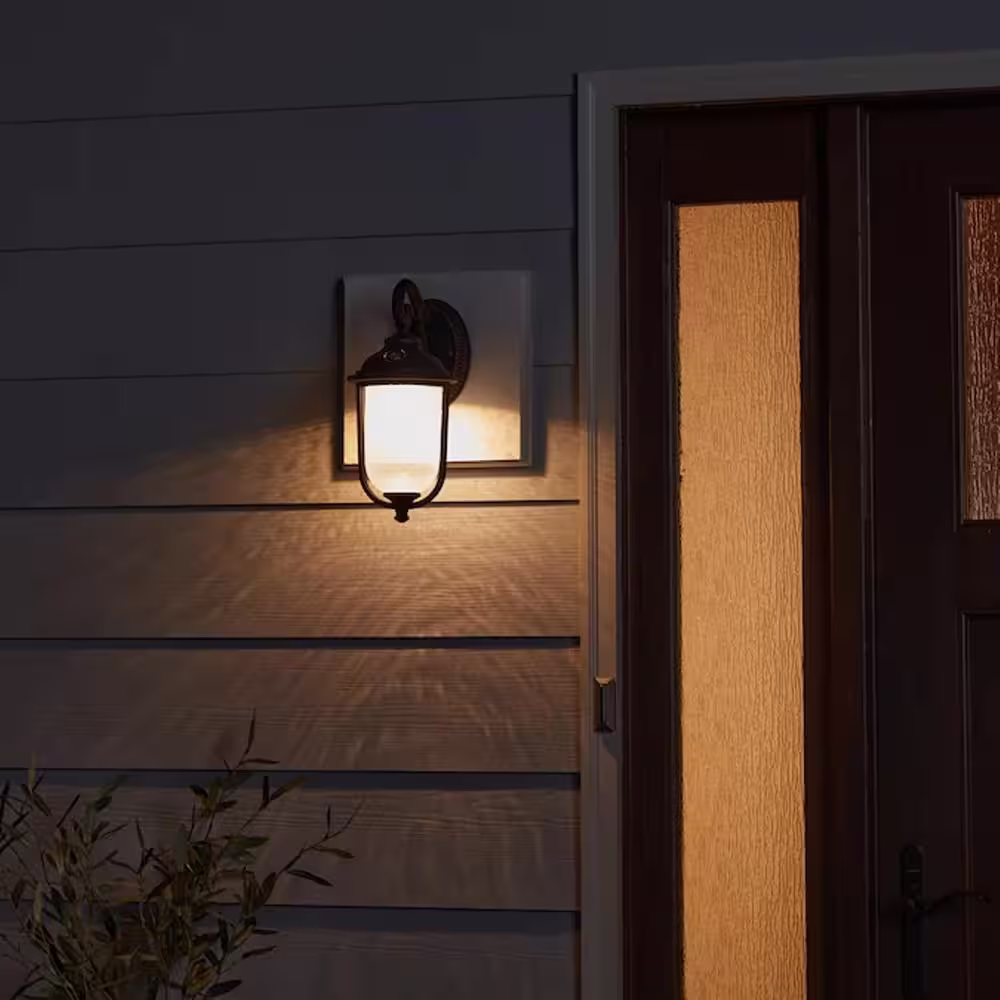 None 40-Watt Equivalent 9 in. D x 14 in. H x 7 in. W Integrated LED Rustic Bronze Area Light Dusk to Dawn Clear Glass