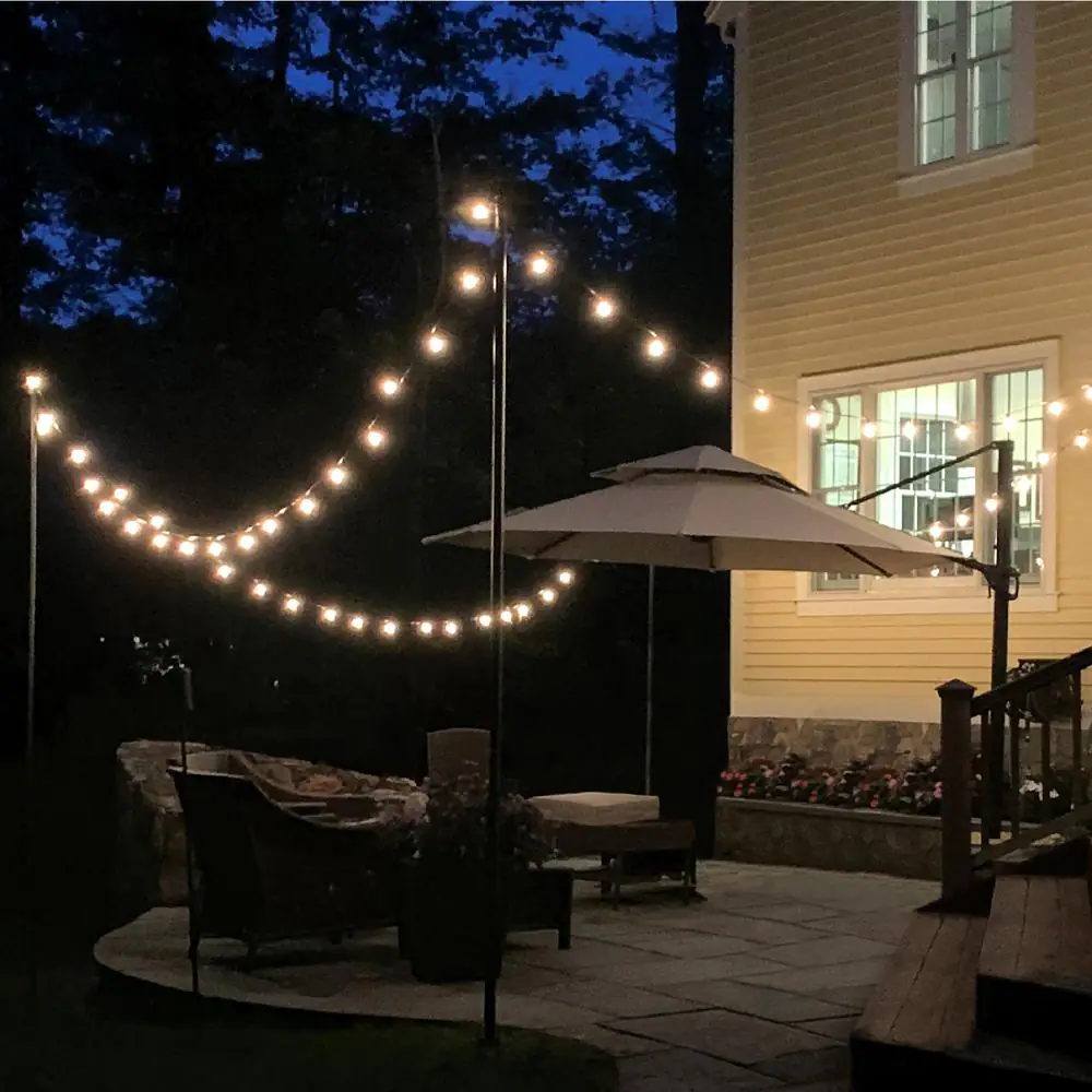 EXCELLO GLOBAL PRODUCTS Outdoor 50 ft. Plug-in Globe Bulb String Light with Two 10 ft. Mounting Poles