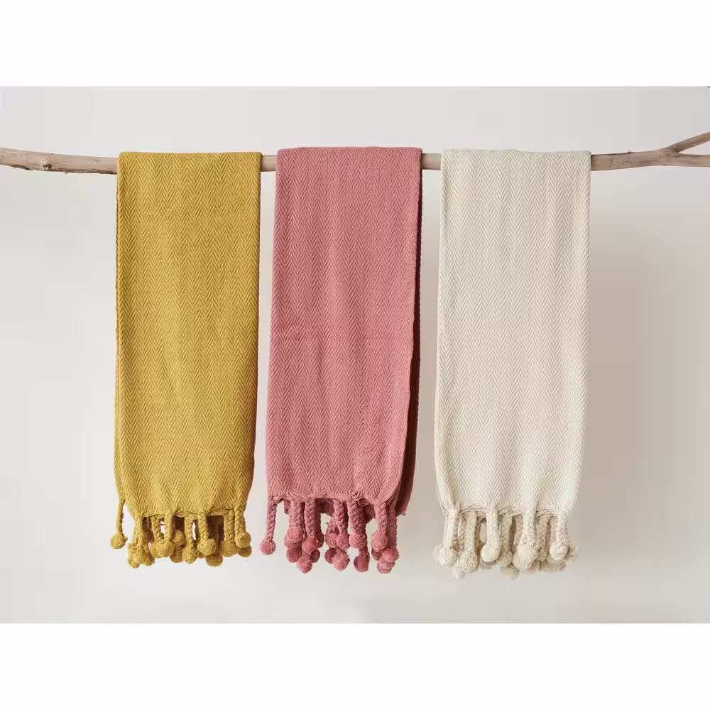 Storied Home Cream Cotton Throw Blanket with Pom Poms