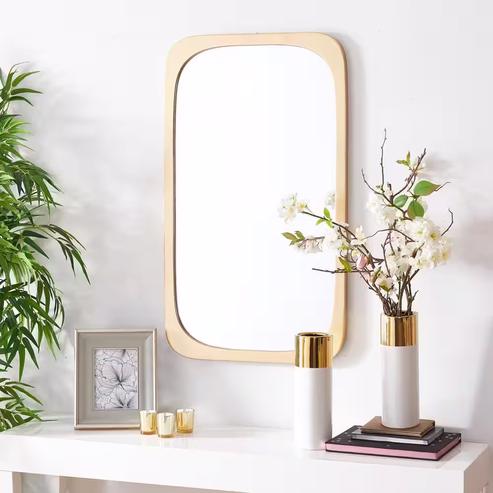 SAFAVIEH Bramwell 21 in. W x 36 in. H Iron Rectangle Modern Gold Wall Mirror