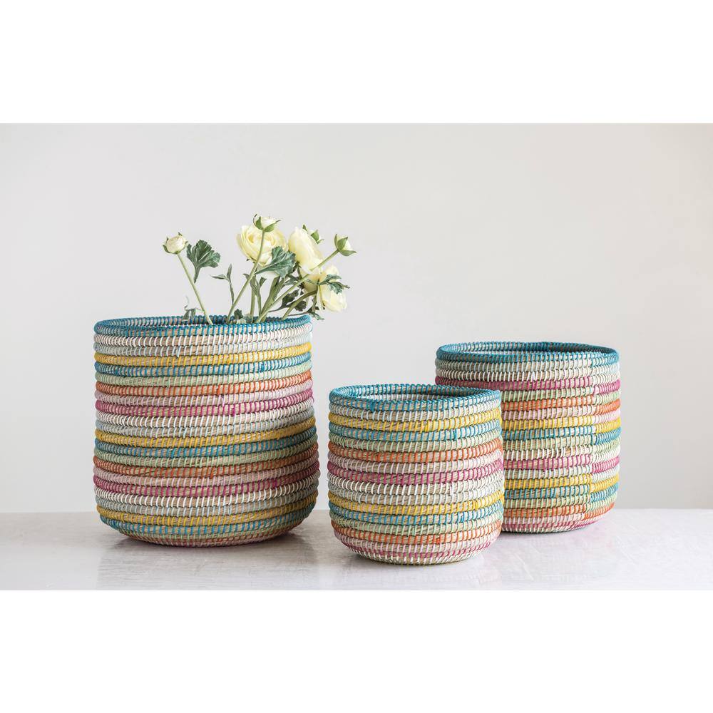 Storied Home Grass Handwoven Decorative Baskets (Set of 3)
