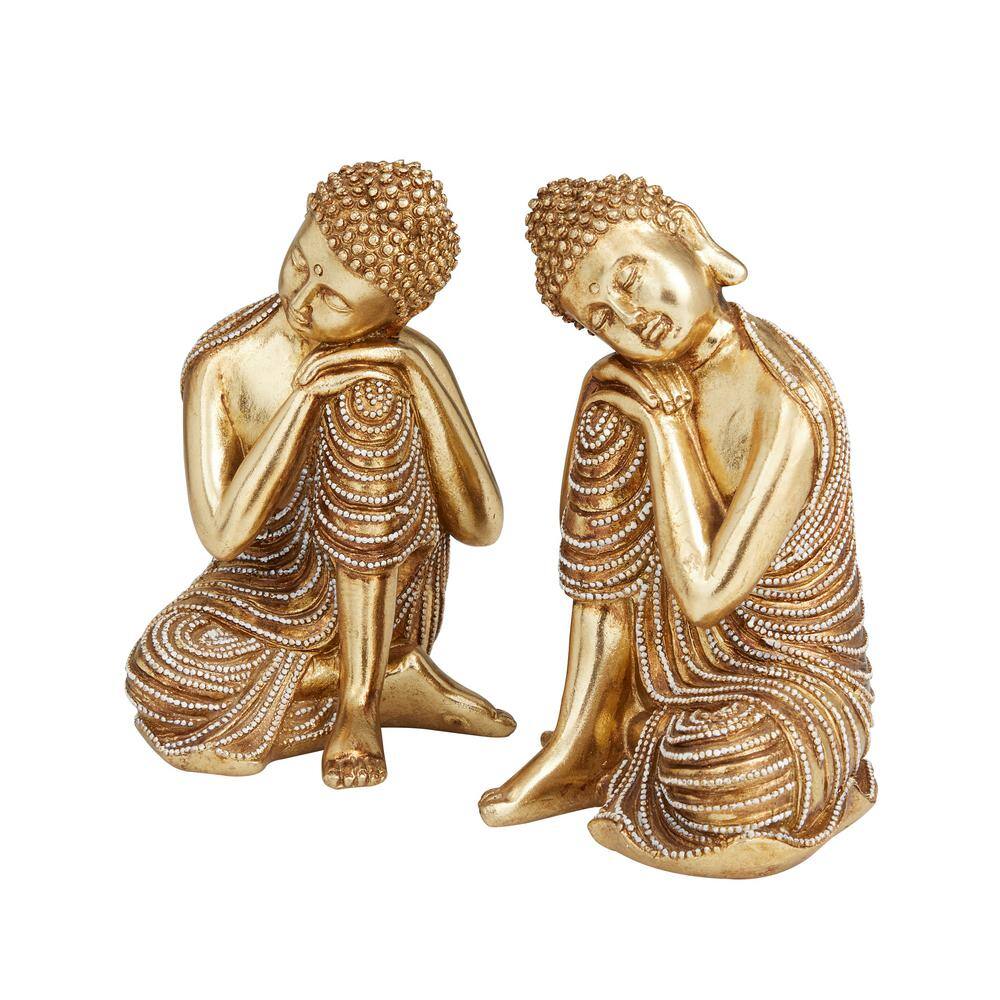 Litton Lane Gold Polystone Meditating Buddha Sculpture with Engraved Carvings and Relief Detailing (Set of 2)