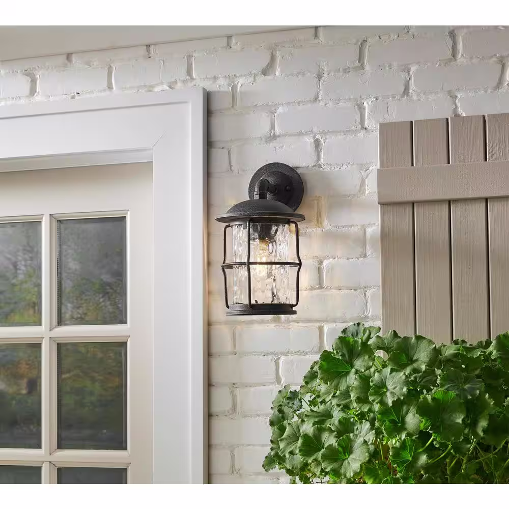 Home Decorators Collection Hargreaves 7 1/2 in. One Light Gilded Iron Rustic Farmhouse Outdoor Wall Lantern Sconce with Seeded Glass