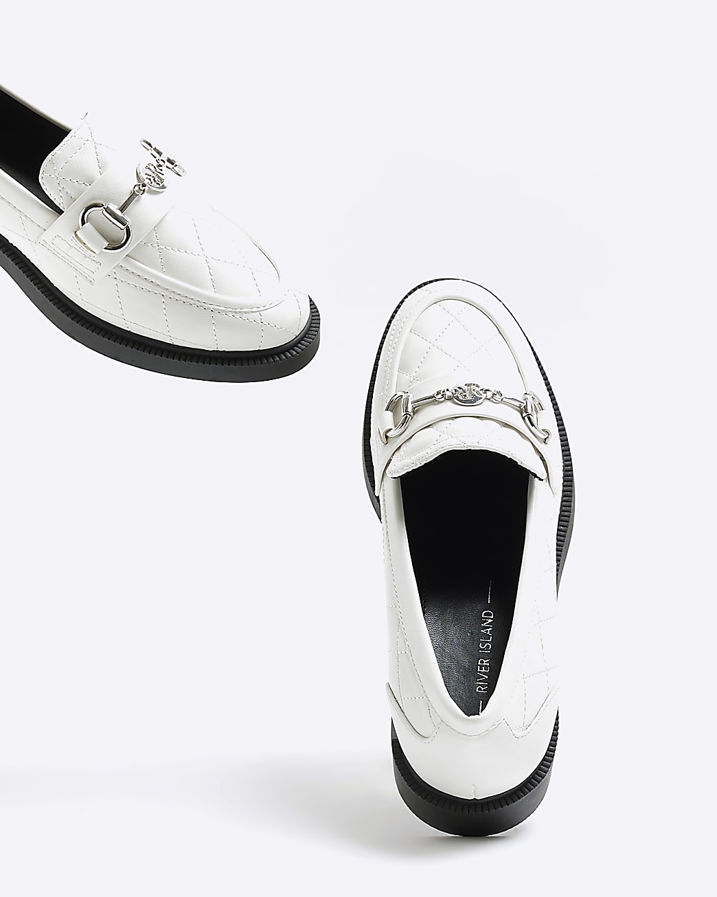 White quilted loafers