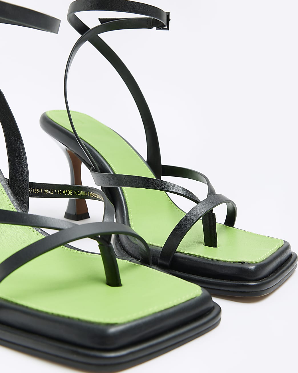 Black strappy heeled sandals