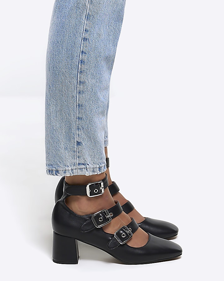 Black buckle heeled shoes