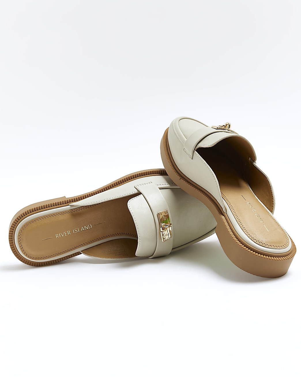 Cream backless loafers
