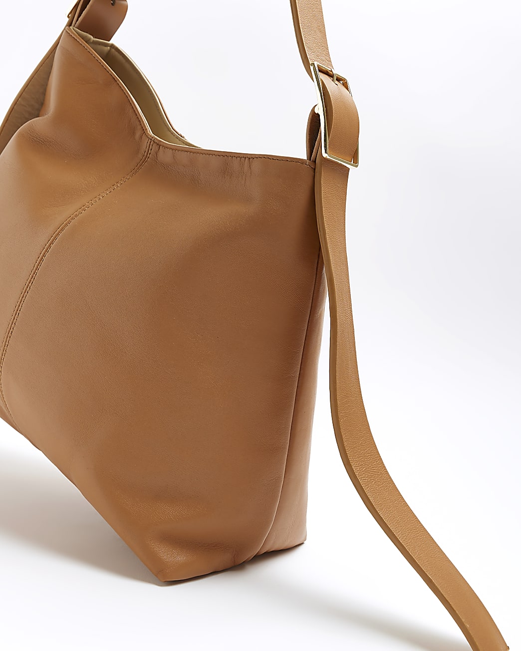 Brown leather asymmetric slouch bag