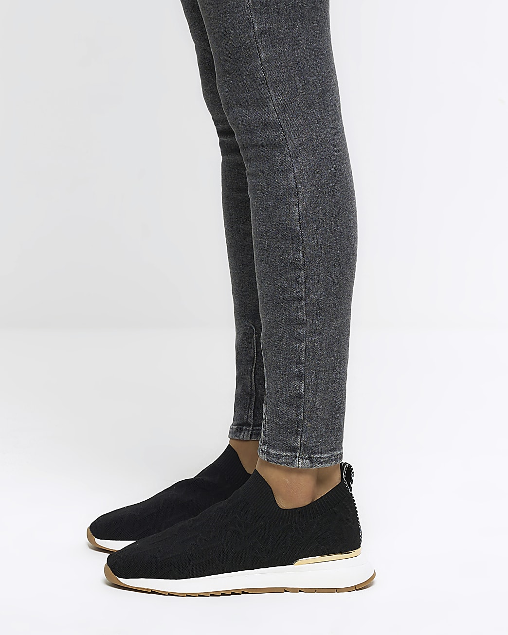 Black wide fit knitted embossed trainers