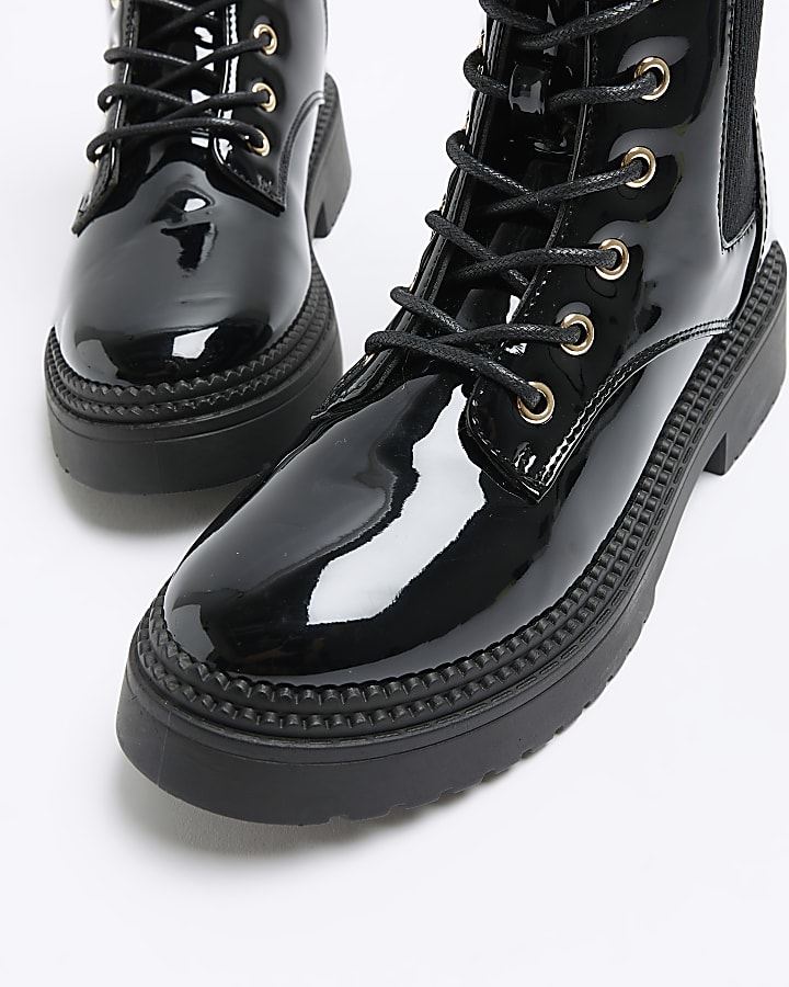 Black patent buckle lace up boots