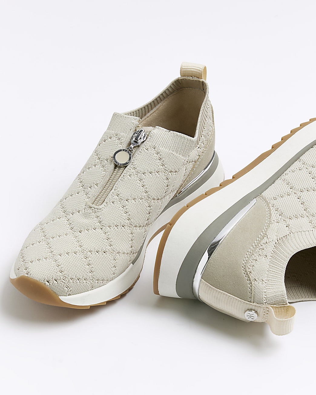 Beige knitted zip trainers