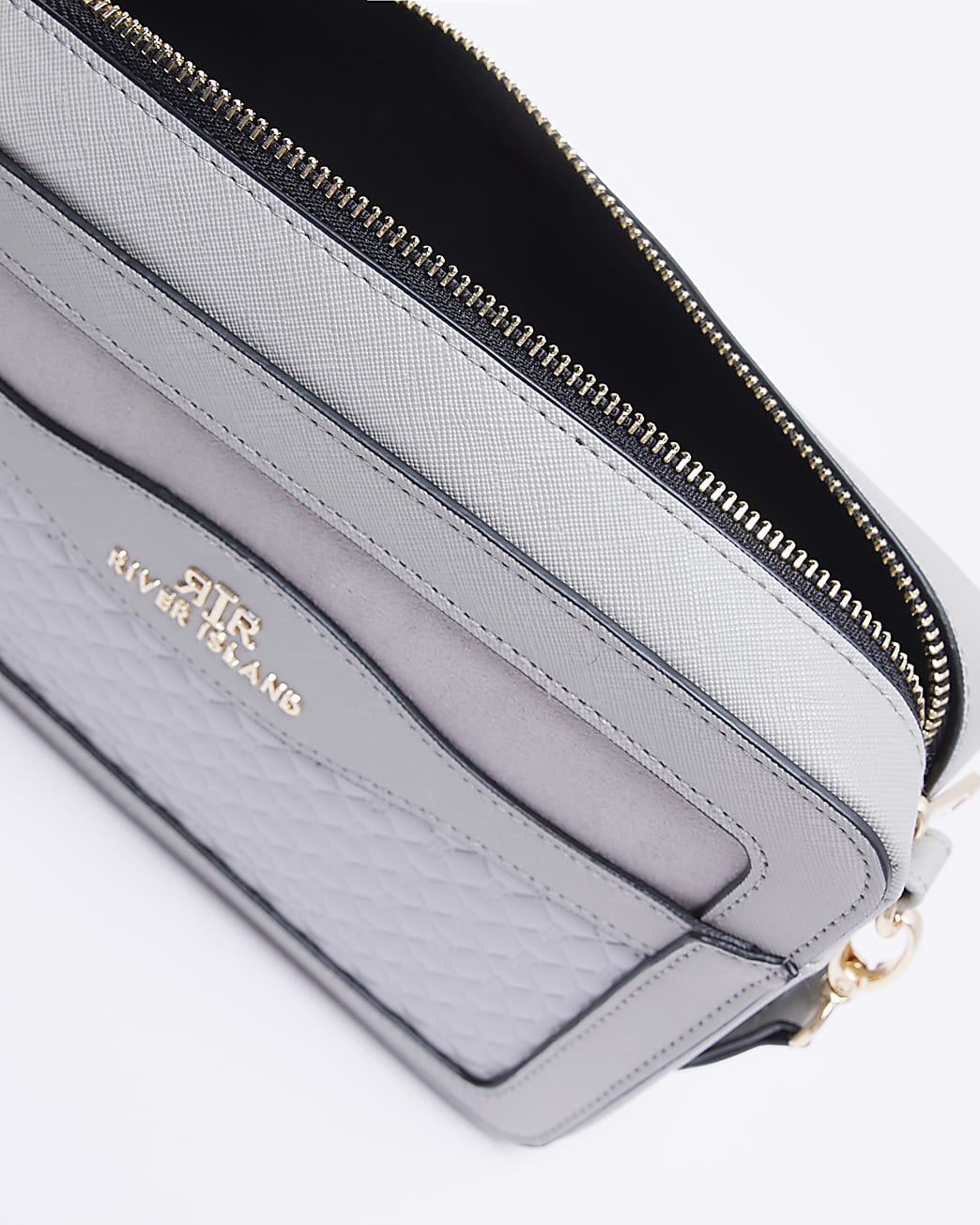 Grey quilted cross body bag