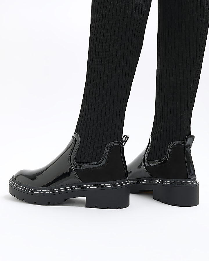 Black knitted high leg boots
