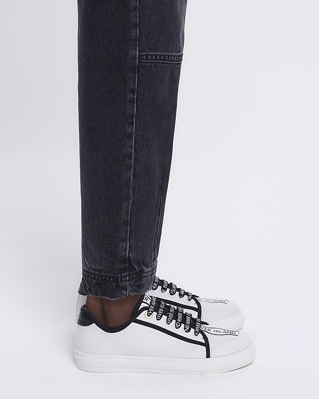 White canvas plimsoll trainers