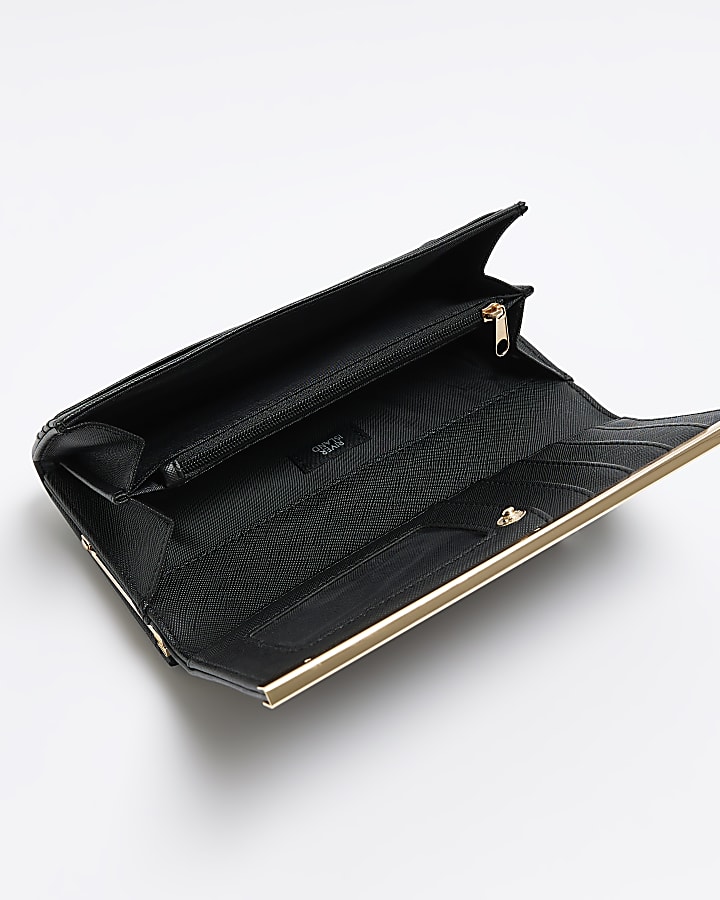 Black quilted clip top purse
