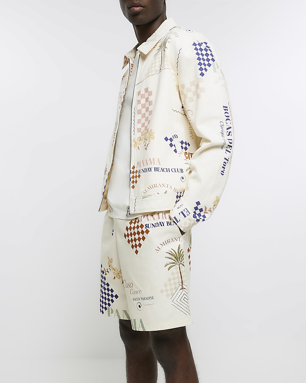 Cream regular fit graphic print shorts