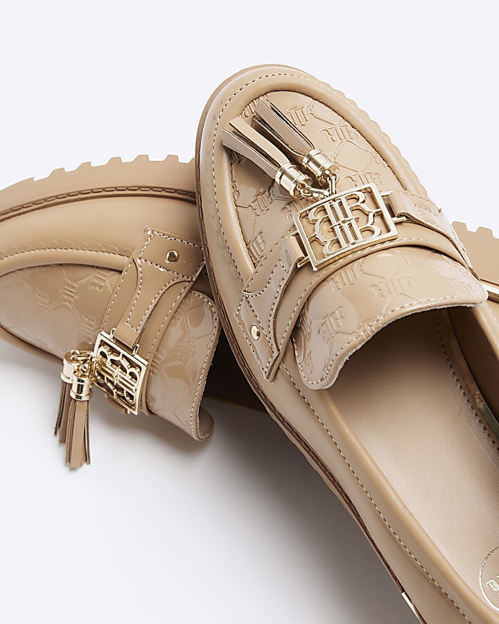 Beige embossed loafers