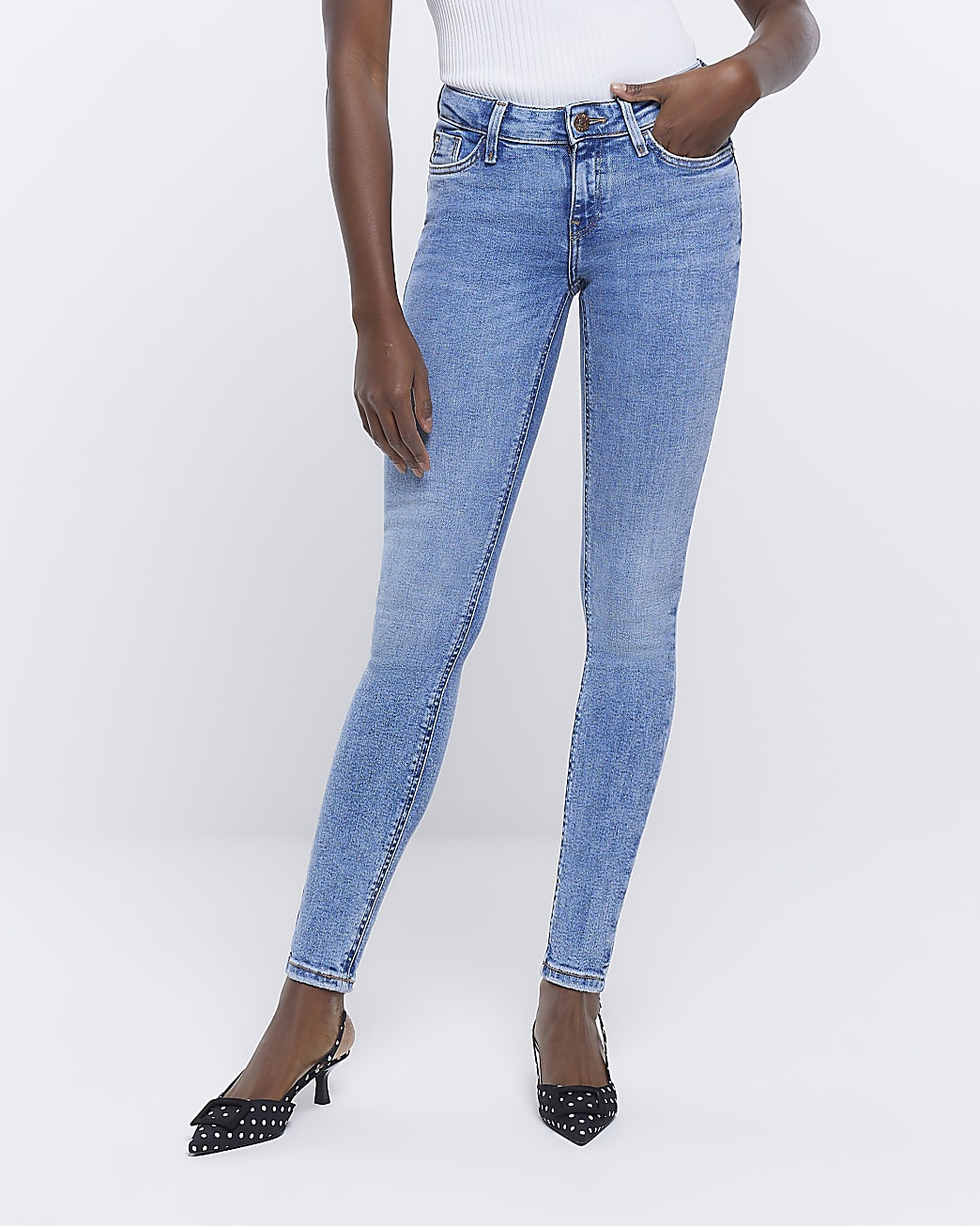 Blue low rise skinny jeans