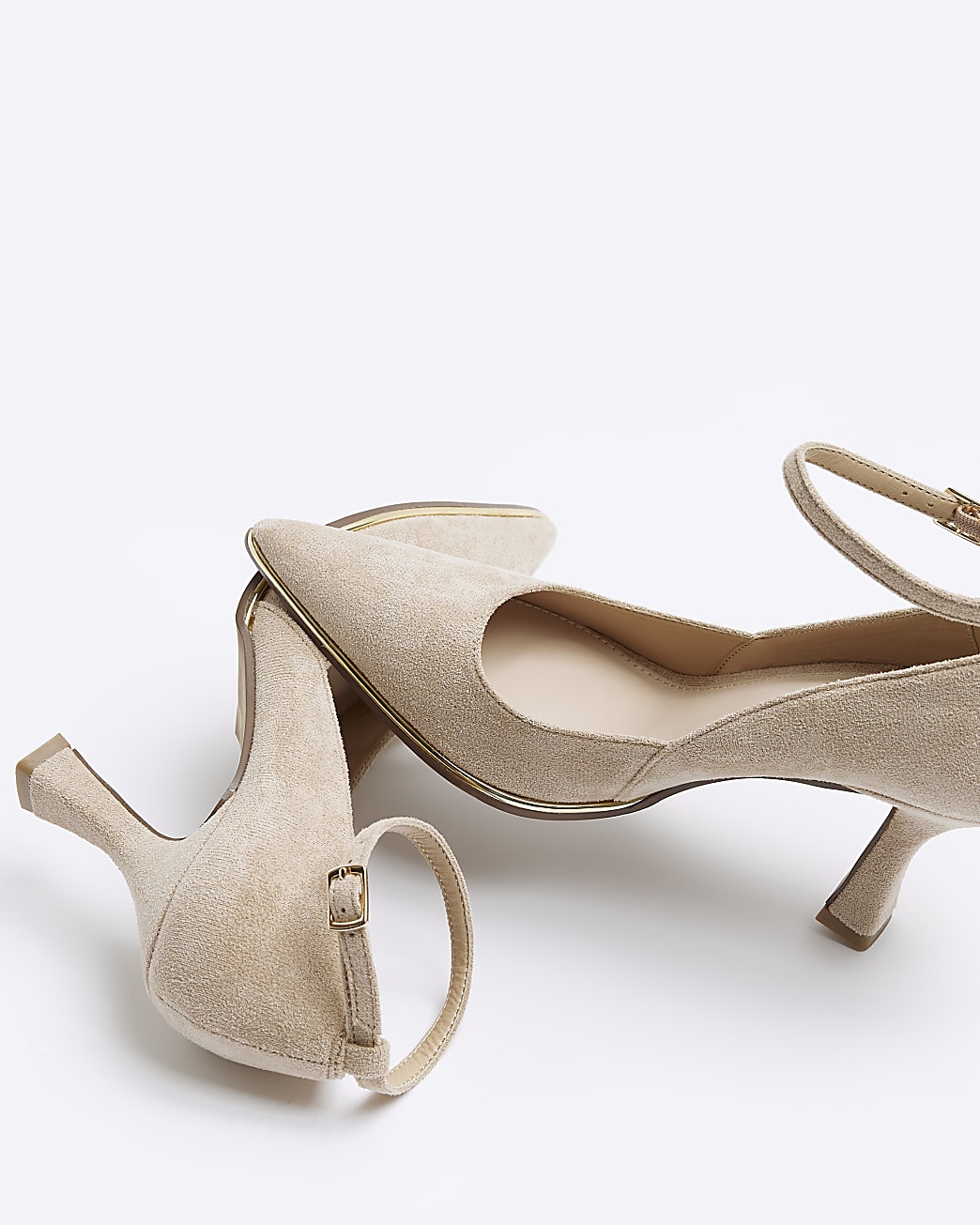Beige pointed heeled court shoes