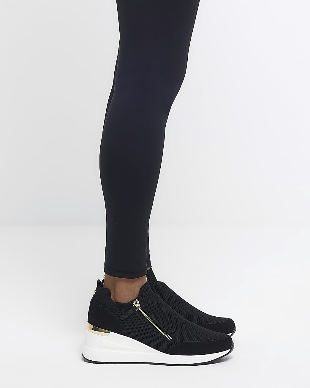 black slip on wedge trainers