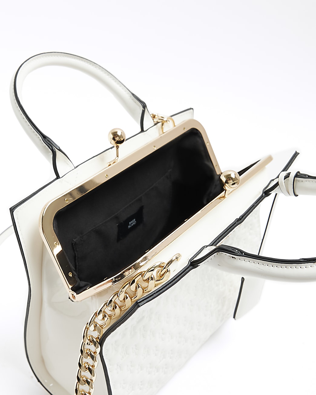White embossed patent clip top tote bag