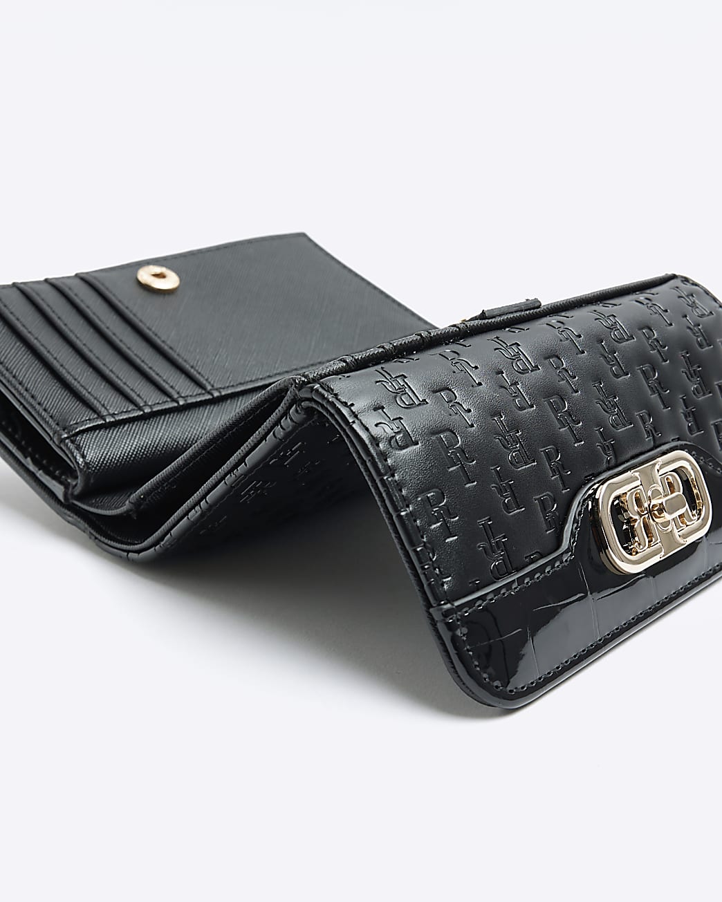 Black embossed purse