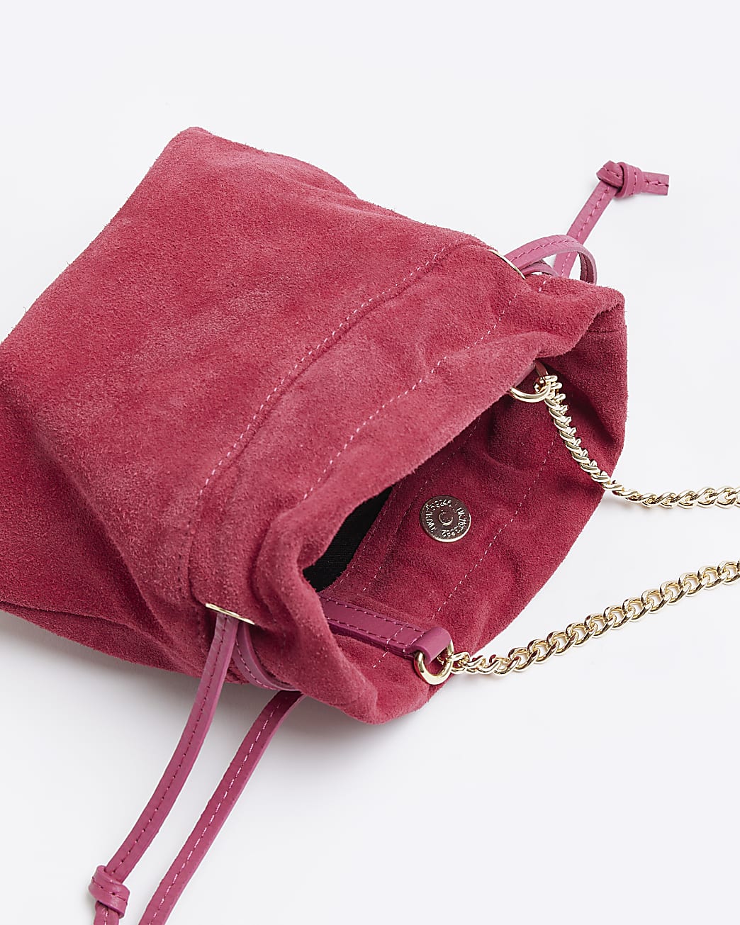 Pink suede drawstring cross body bag