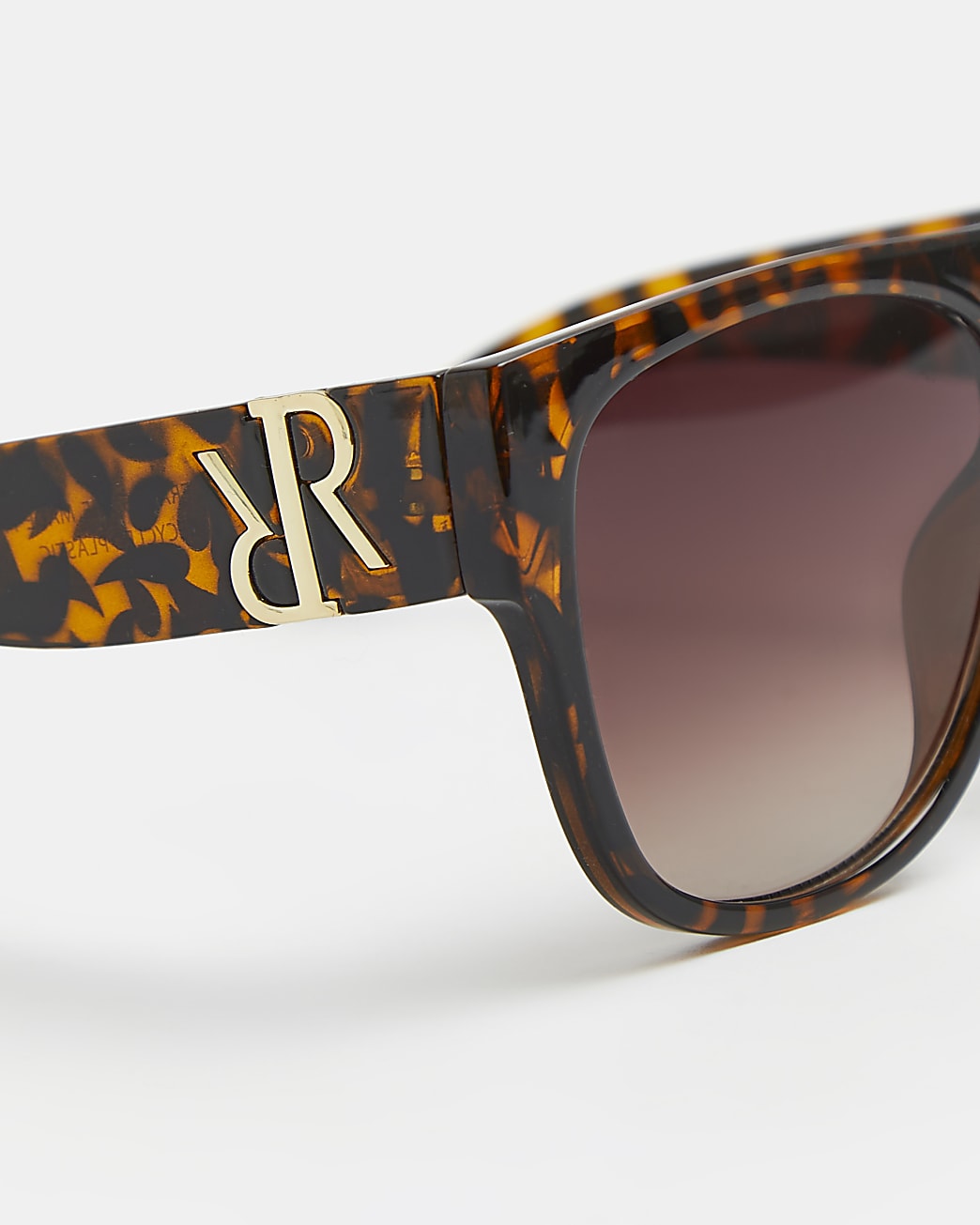 Brown tortoiseshell visor sunglasses