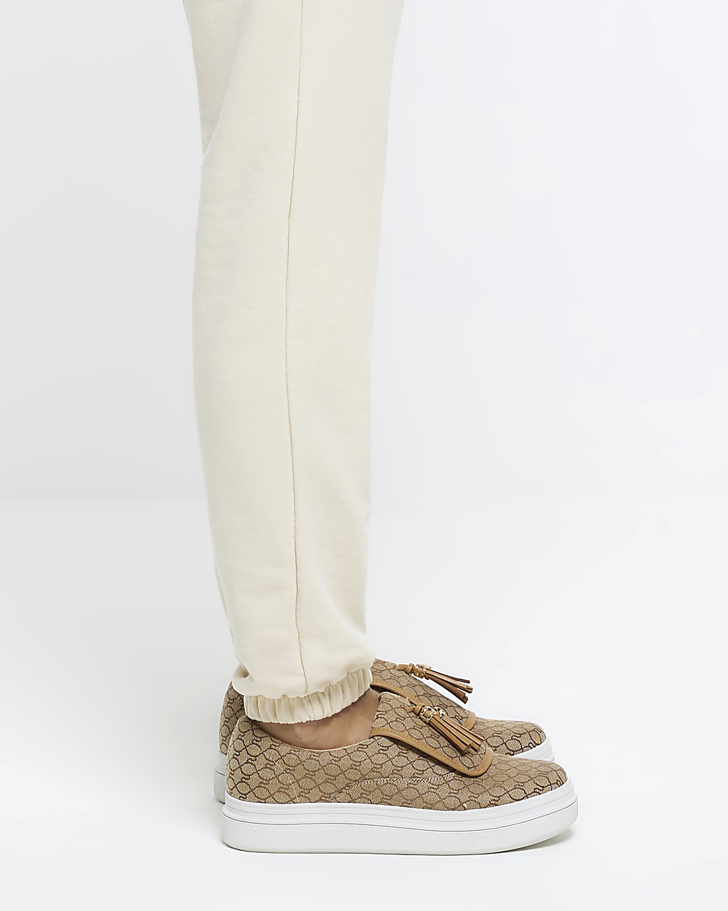 Brown tassel monogram plimsols