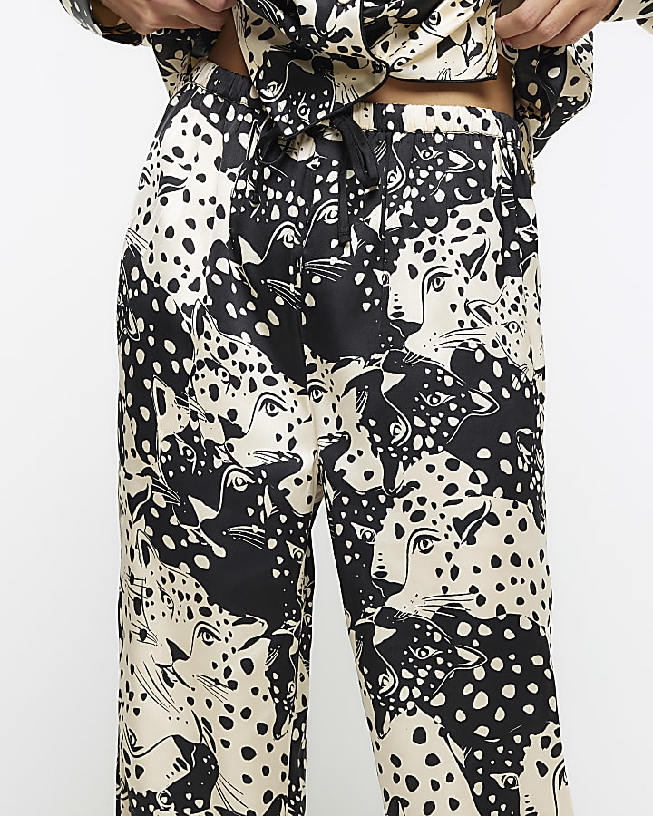 Black satin animal print pyjama trousers