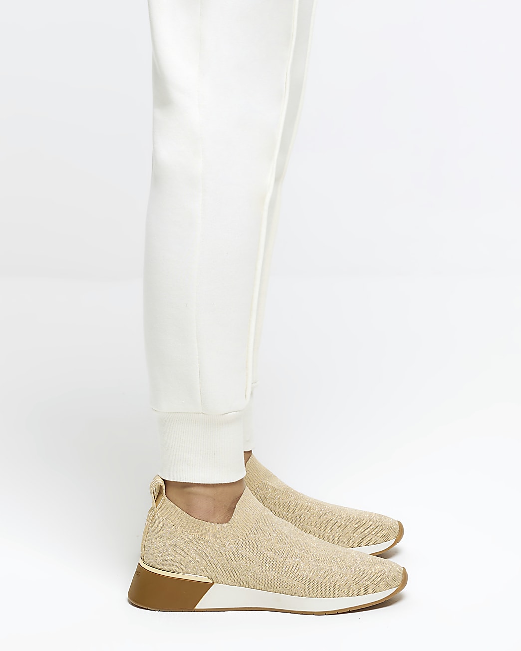 Gold embossed knitted trainers