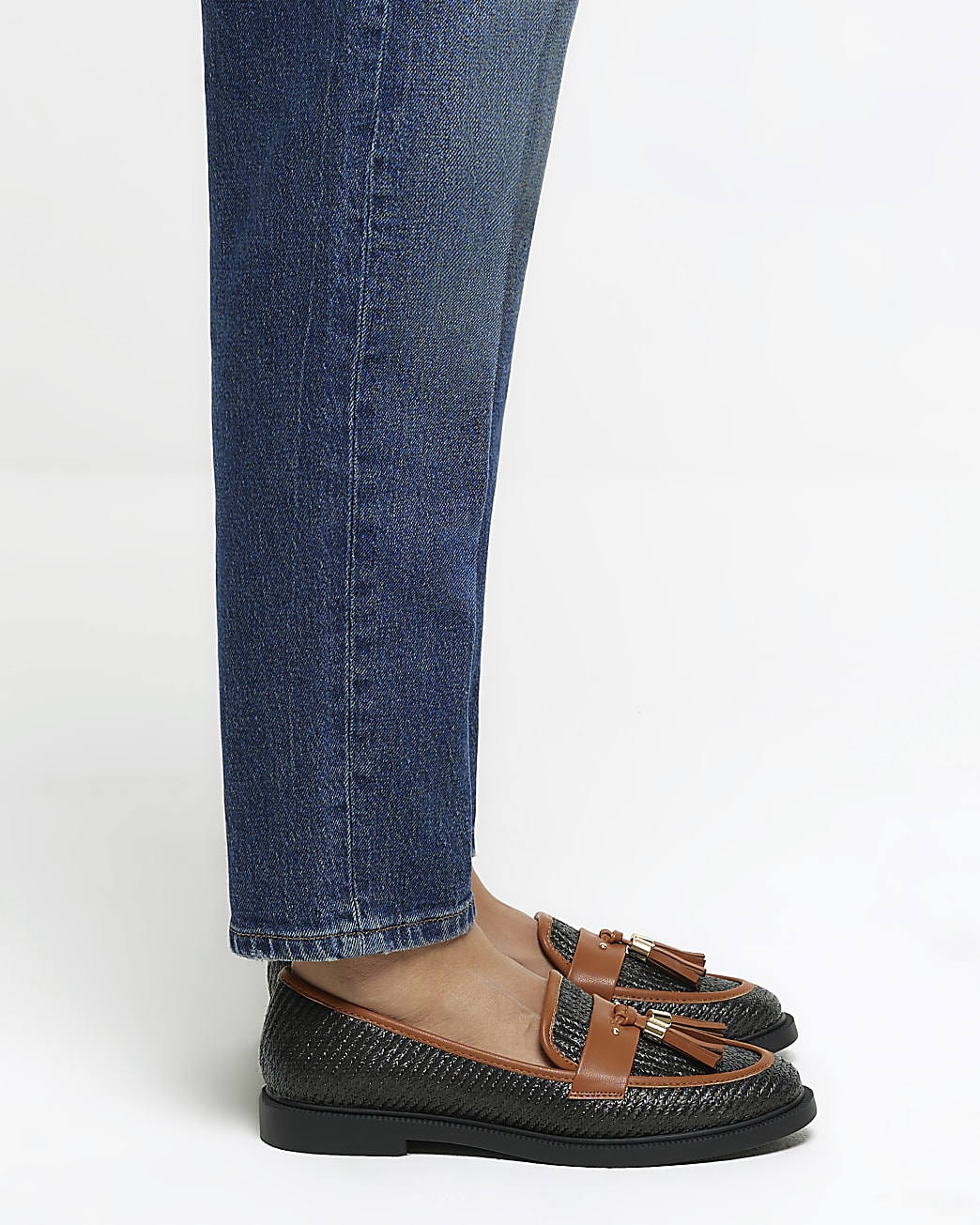Black tassel trim loafers