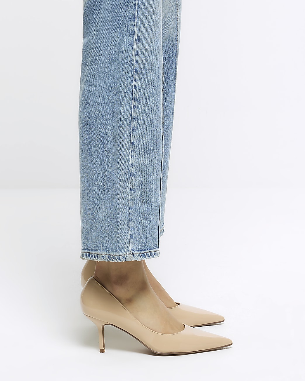 Beige pointed toe heeled court shoes