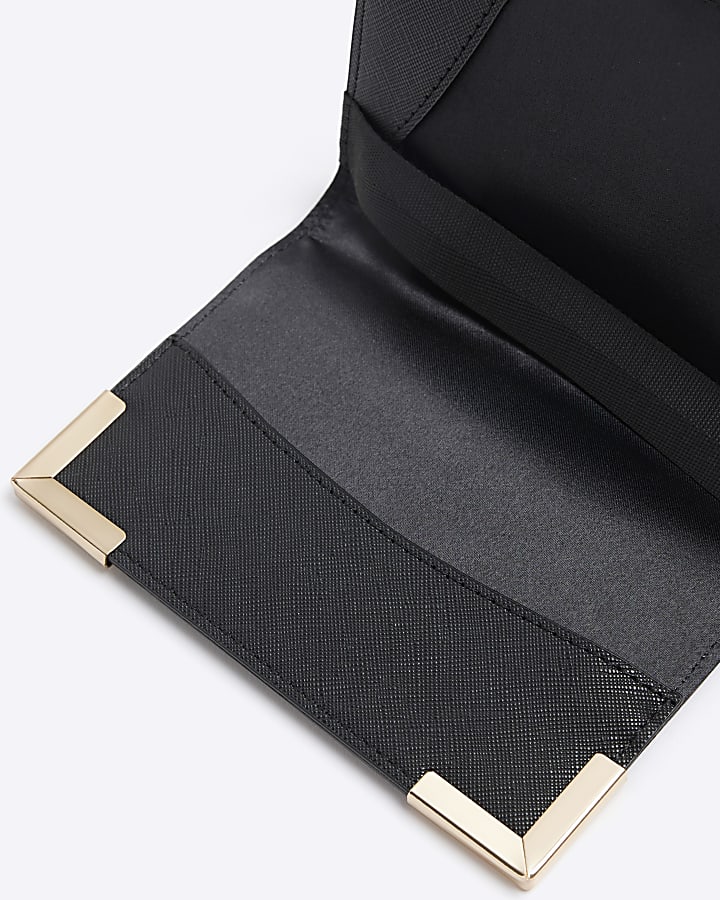 Black embossed RI passport cover