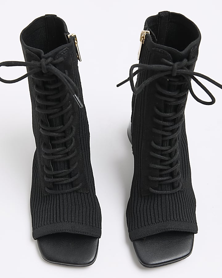 Black knitted open toe heeled boots