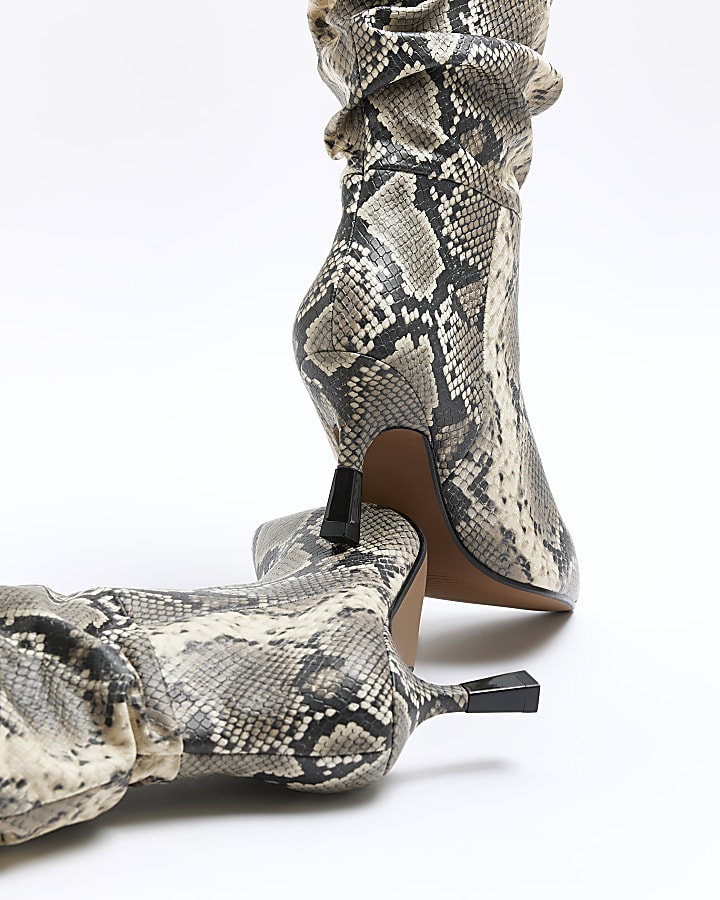 Beige animal print slouch heeled boots