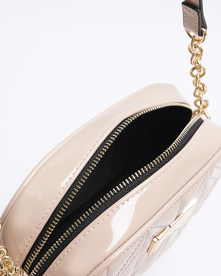 Pink quilted bow detail cross body bag