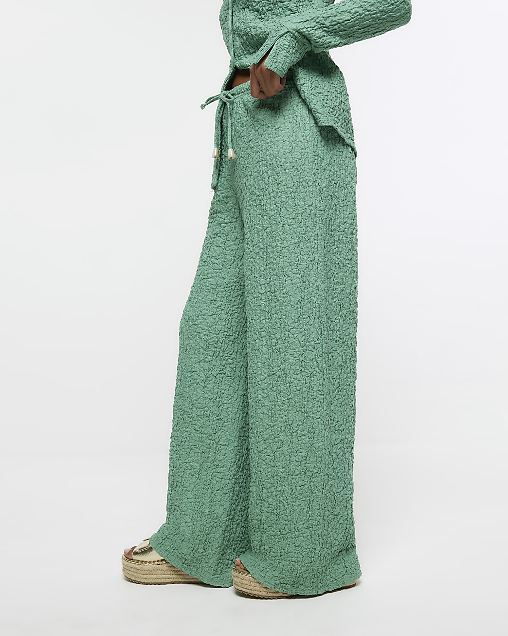 Petite green textured wide leg trousers