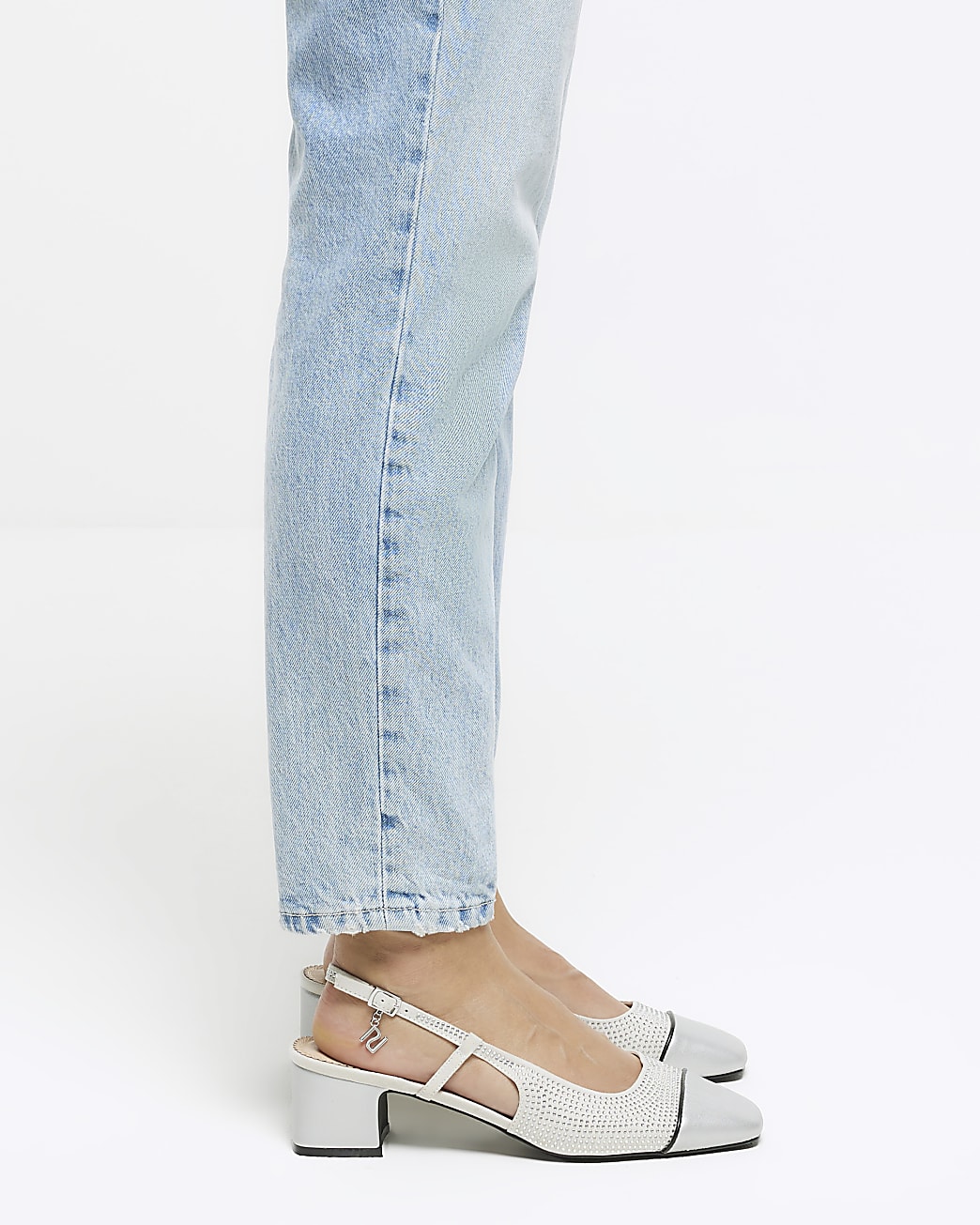 Silver heeled slingback shoes