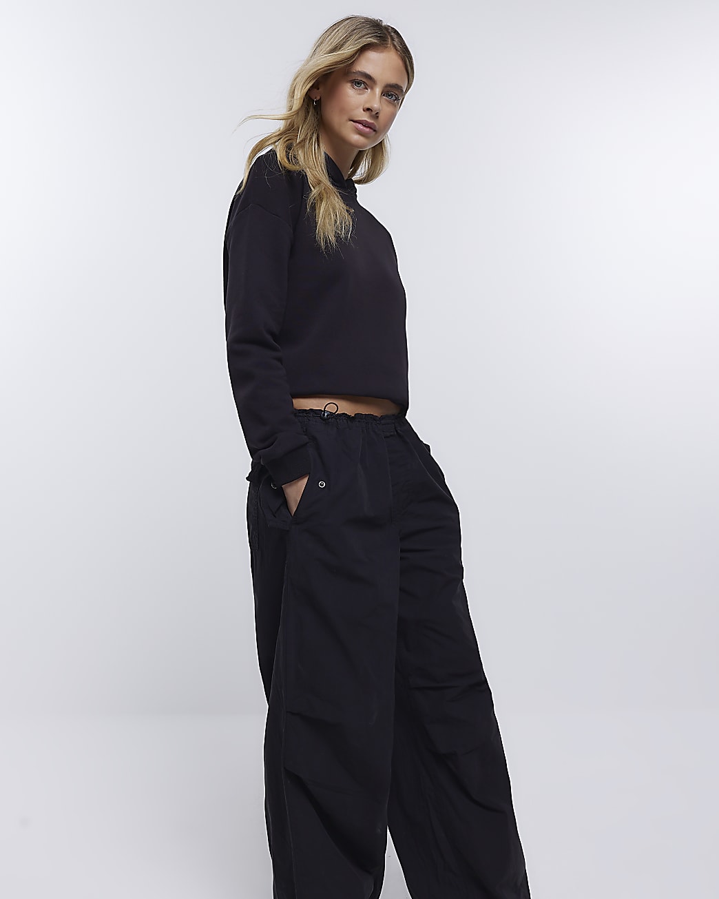 Black low rise parachute trousers