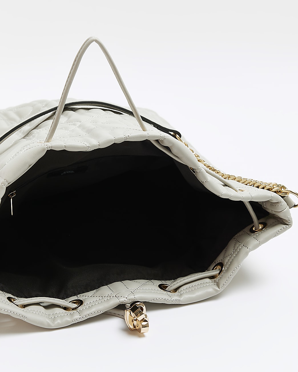 Grey quilted drawstring shoulder bag