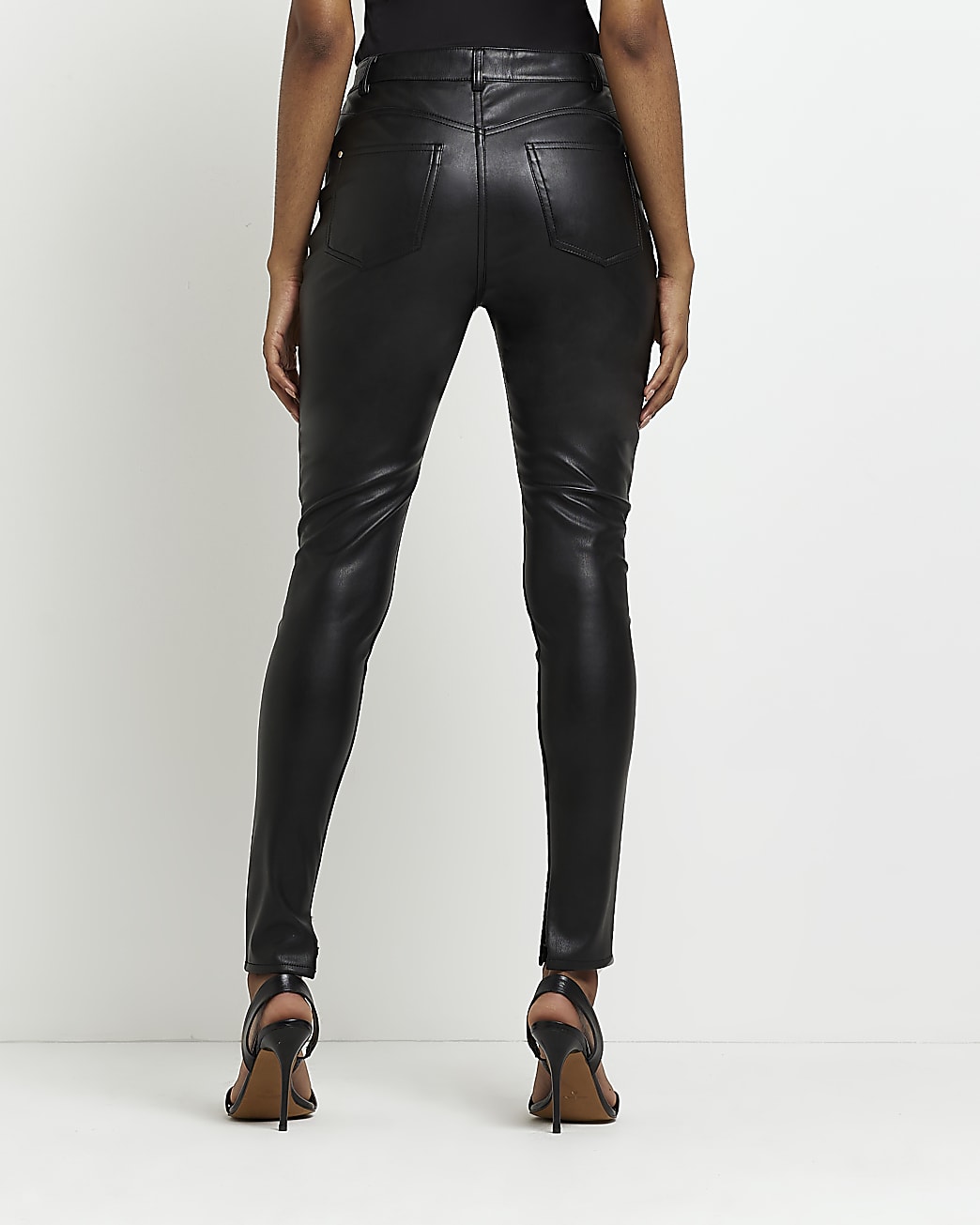 Black faux leather bum sculpt skinny trousers