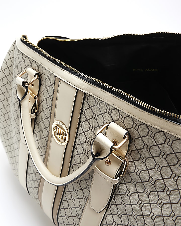 Beige RI monogram travel bag